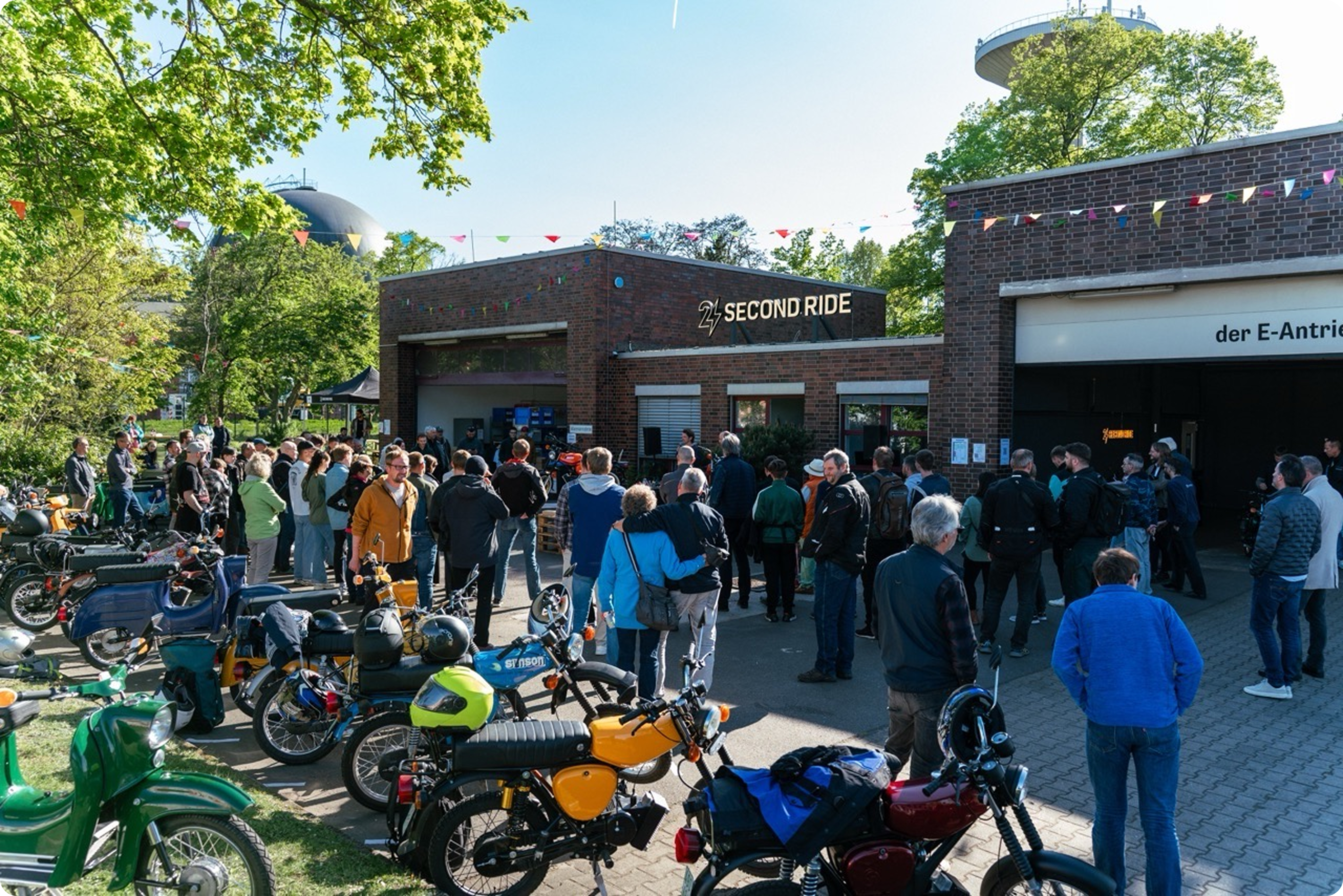 The Second Ride team in the courtyard at Community Day